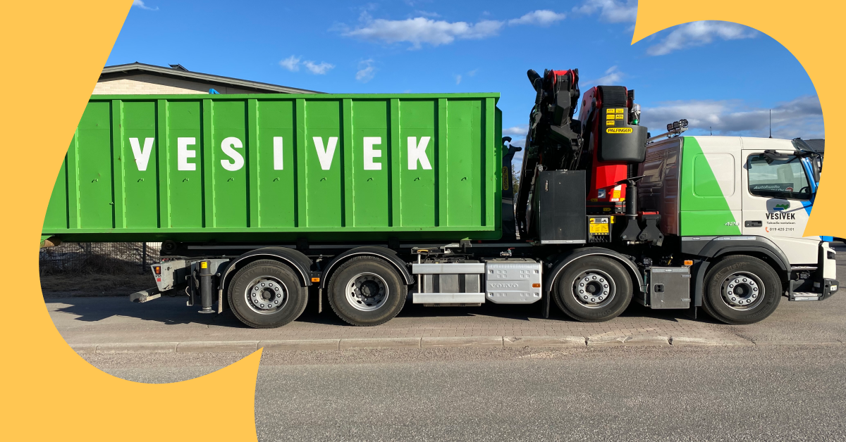 Side view of a large green truck belonging to Vesivek.