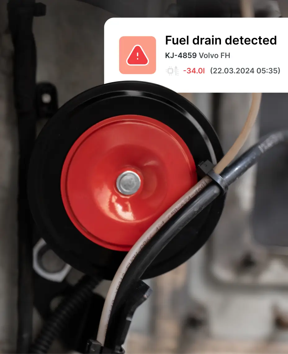Alert interface indicating a fuel drain detected as part of fleet fuel management and fuel control system.