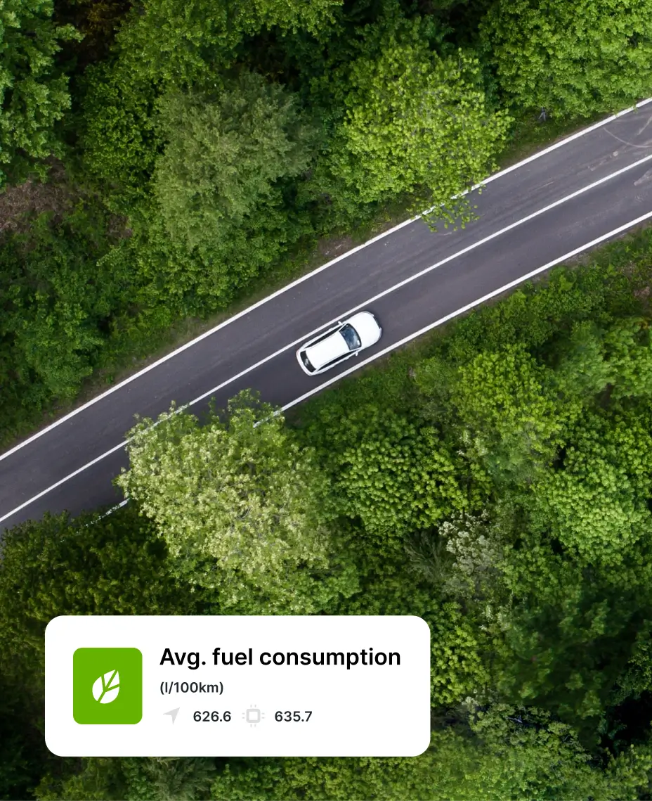 Vehicle driving through greenery illustrating sustainable fleet fuel management and eco-friendly fuel control.