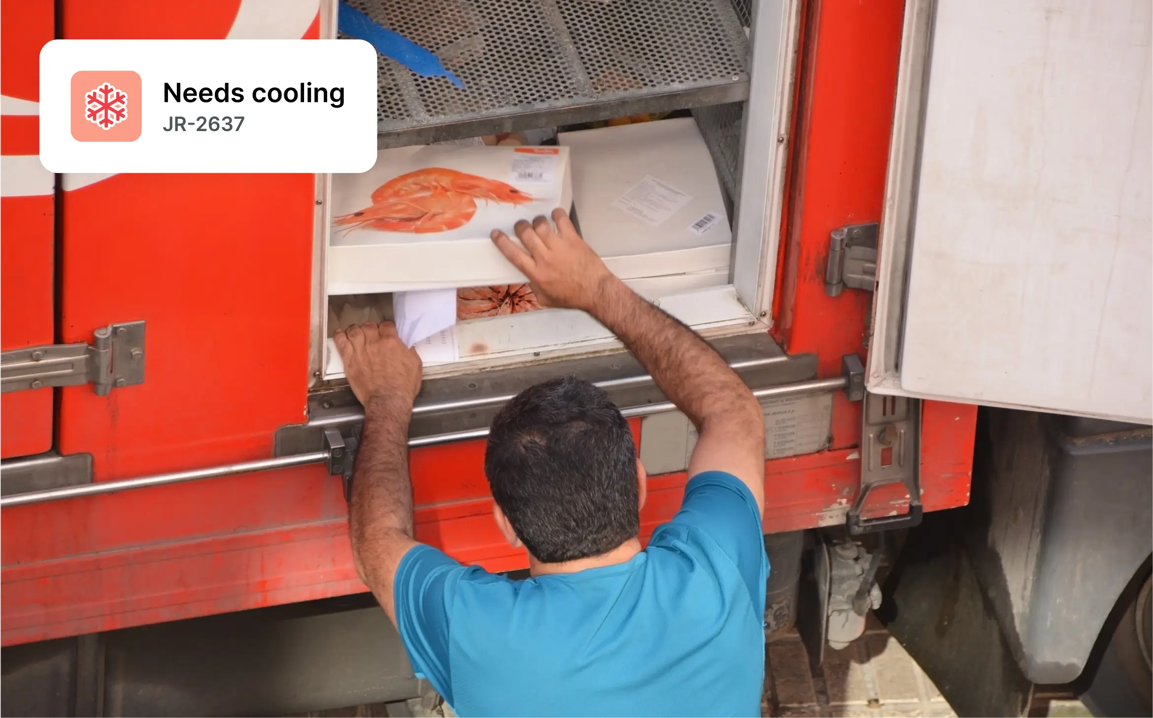 Worker placing seafood boxes into a refrigerated truck with a “Needs cooling” alert displayed.