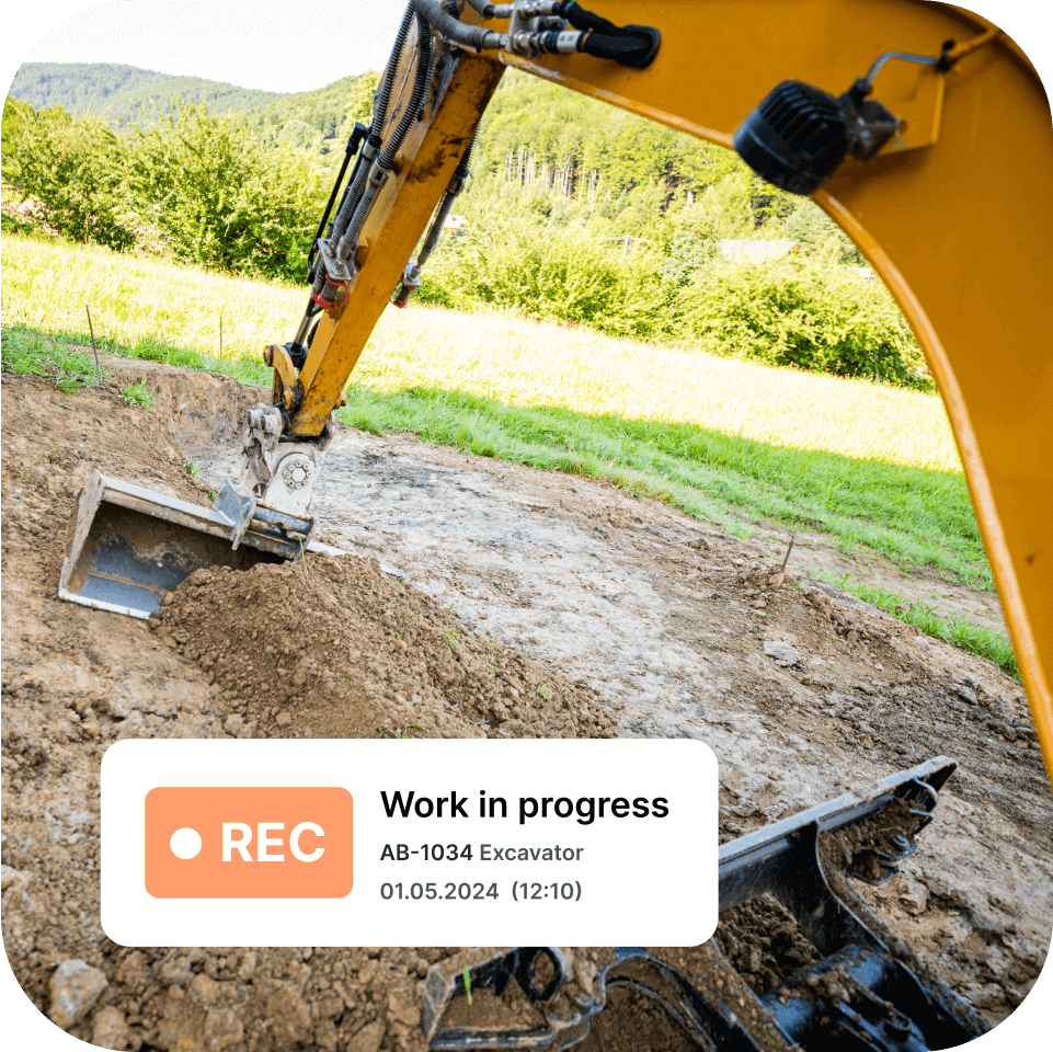 A still frame from a fleet dash cam video, showing a wheel loader at a worksite with graphics overlay saying "Recording. Work in progress".