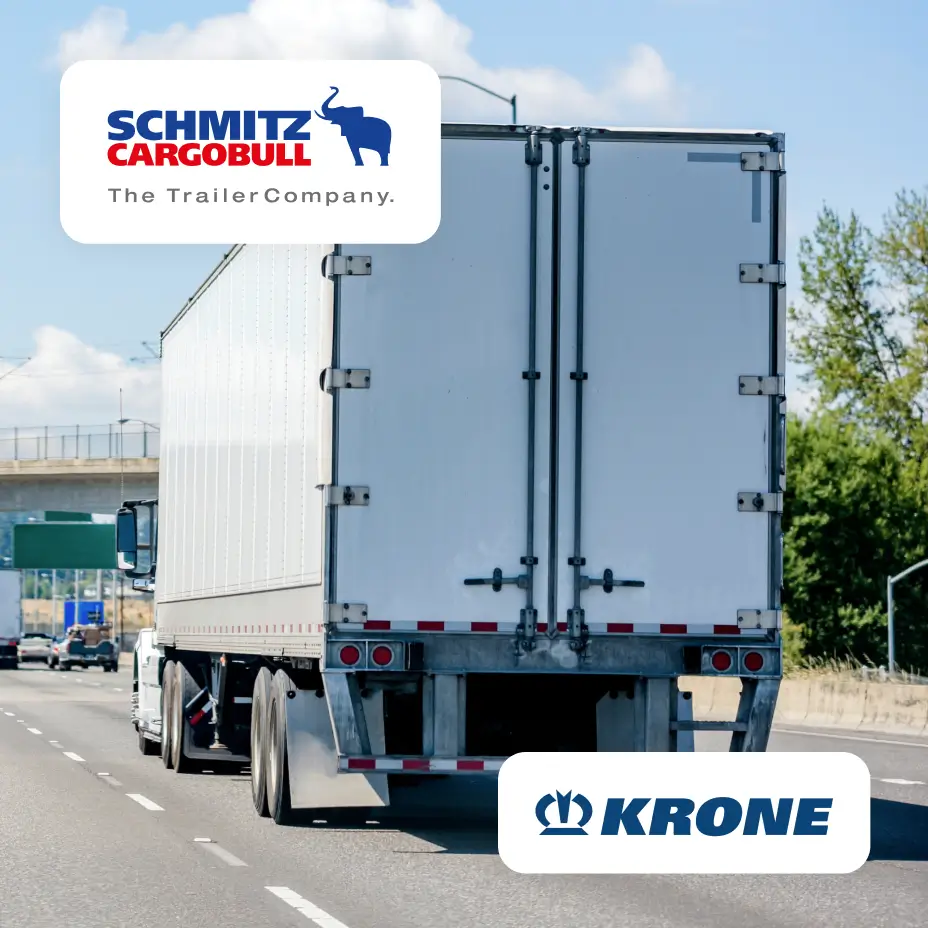 A white truck with a white trailer driving on a highway, Schmitz Cargobull and KRONE logos seen around the trailer.